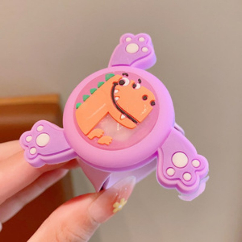 Rotating purple bracelet, dinosaur