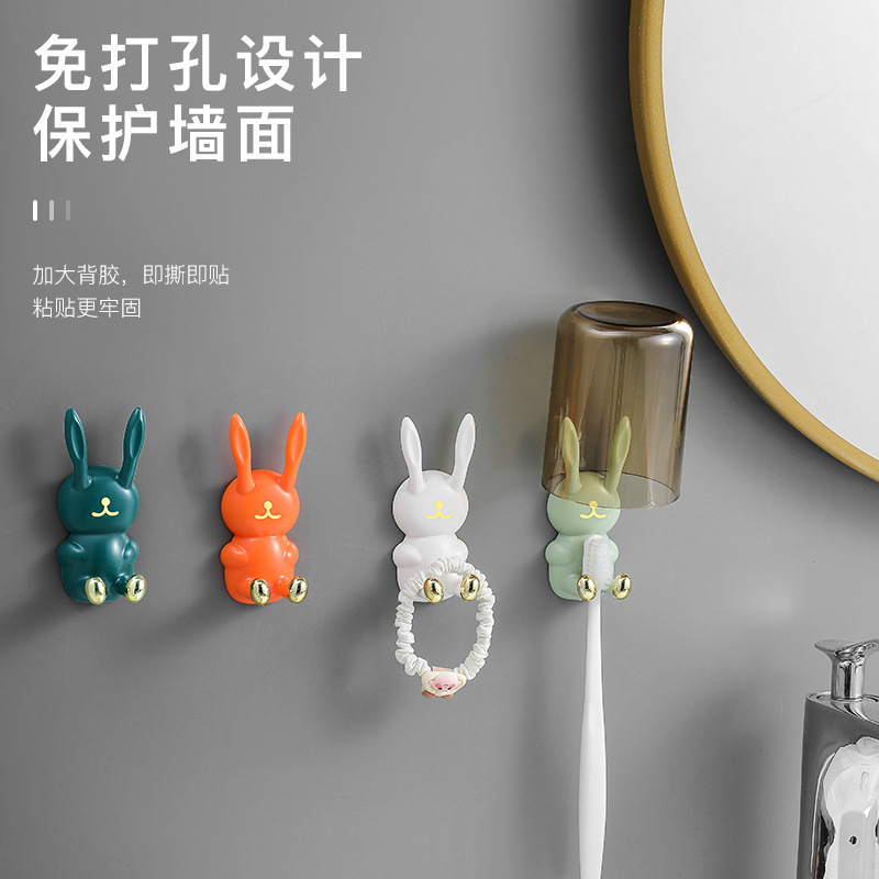 Cute rabbit punch-free hook seamless wall hanging storage wash cup toothbrush rack bathroom multi-functional sticky hook