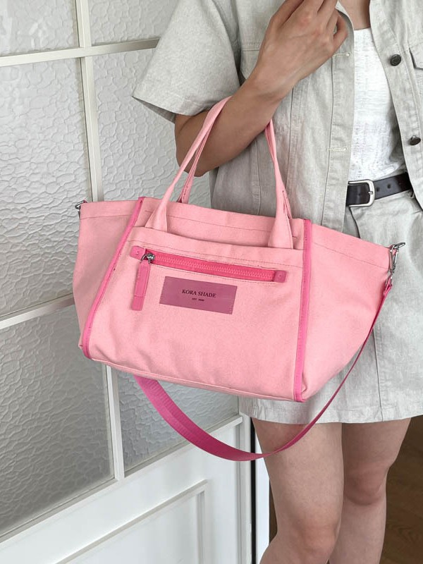 Bolso de lona de gran capacidad para mujeres 2026 nuevo tipo de mochila de hombro simple y casual para la clase de la bolsa de viaje