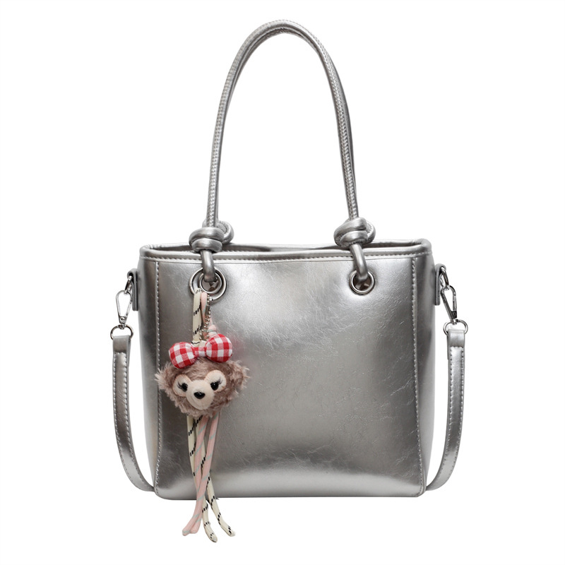 Bolso de hombro universal super caliente para mujeres 2025, nuevo diseño de moda, bolso de mano de alta calidad, bolso de cubo de agua.