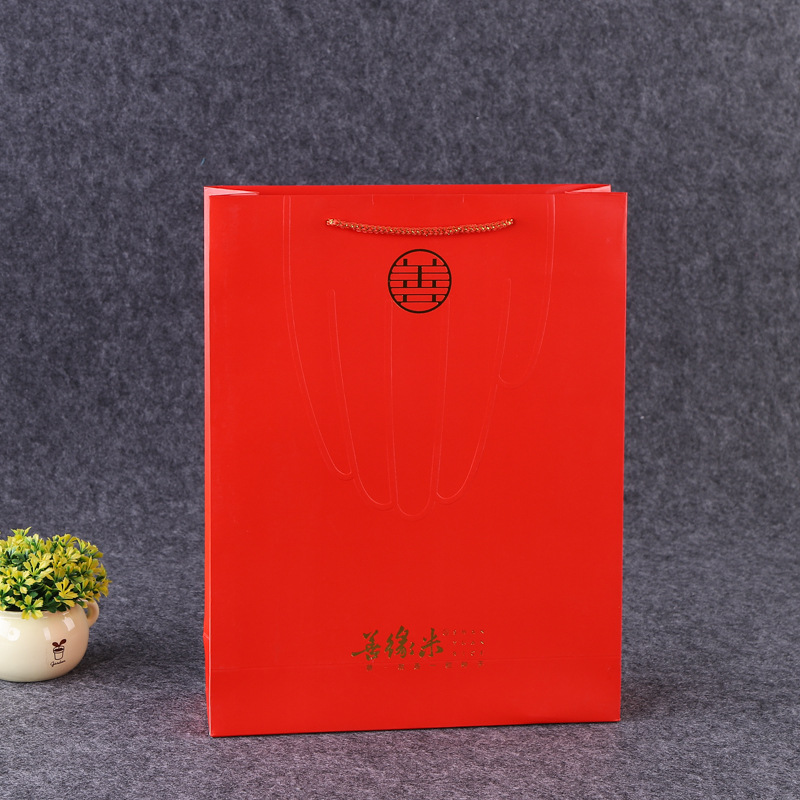 厂家定做白卡纸袋手提纸袋商场礼品包装袋服装购物纸袋定制印logo