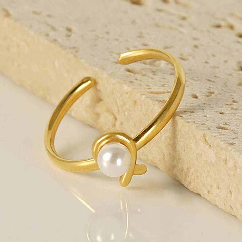 Transfronterizo europeo y americano perla abierta anillo de acero de titanio moda femenina todo partido ajustable dieta anillo de dedo anillo de acero inoxidable al por mayor