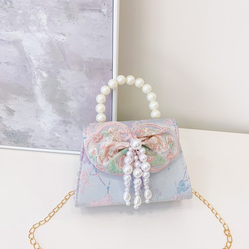 Bolso bandolera para niñas de estilo chino nuevo bolso bandolera para niños con borla portátil de perlas 2024 nuevo bolso de cadena para niños