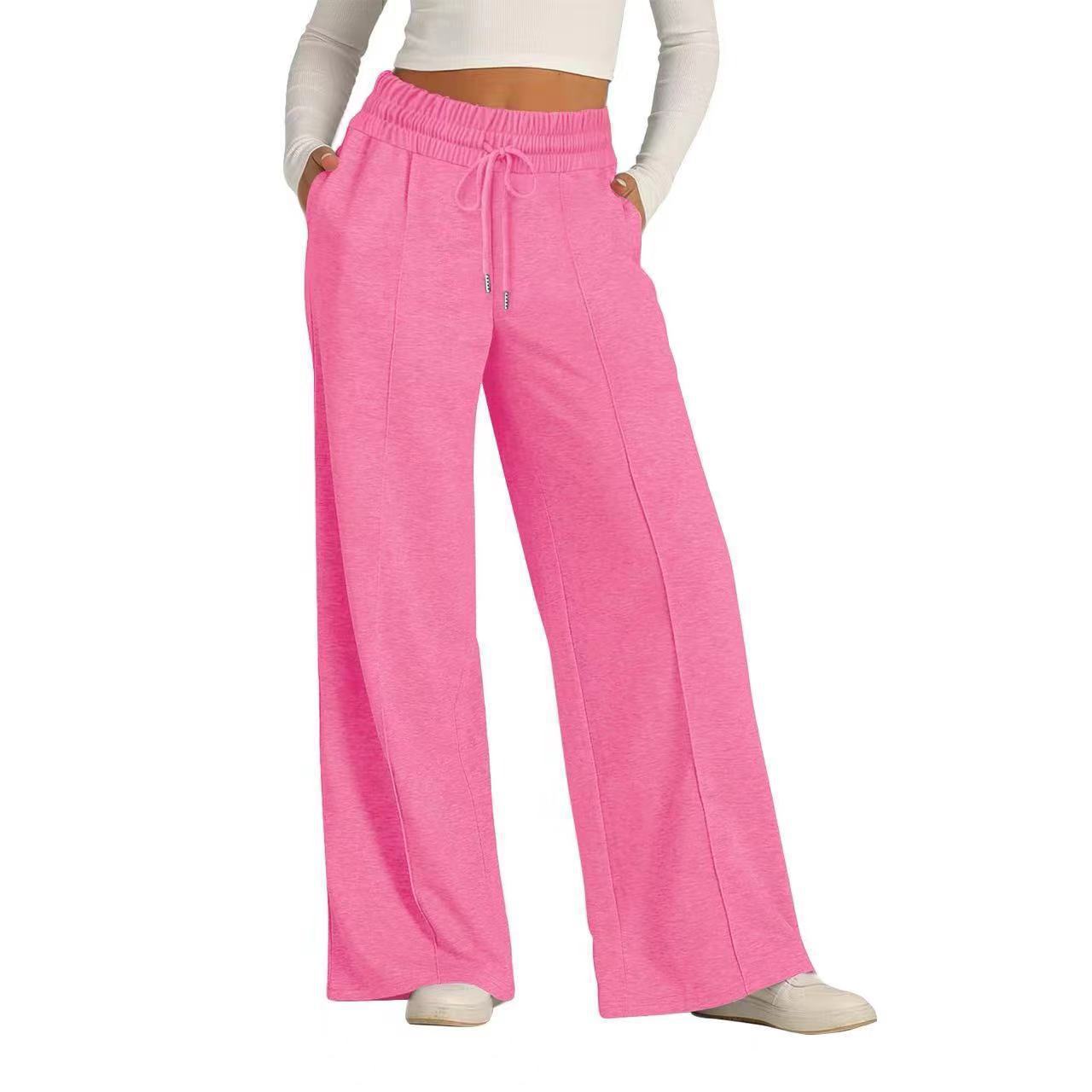 Europa y los Estados Unidos de moda transfronteriza de color sólido tendencia de pulsación temperamento de estilo de viaje pantalones casuales personales pantalones rectos sueltos