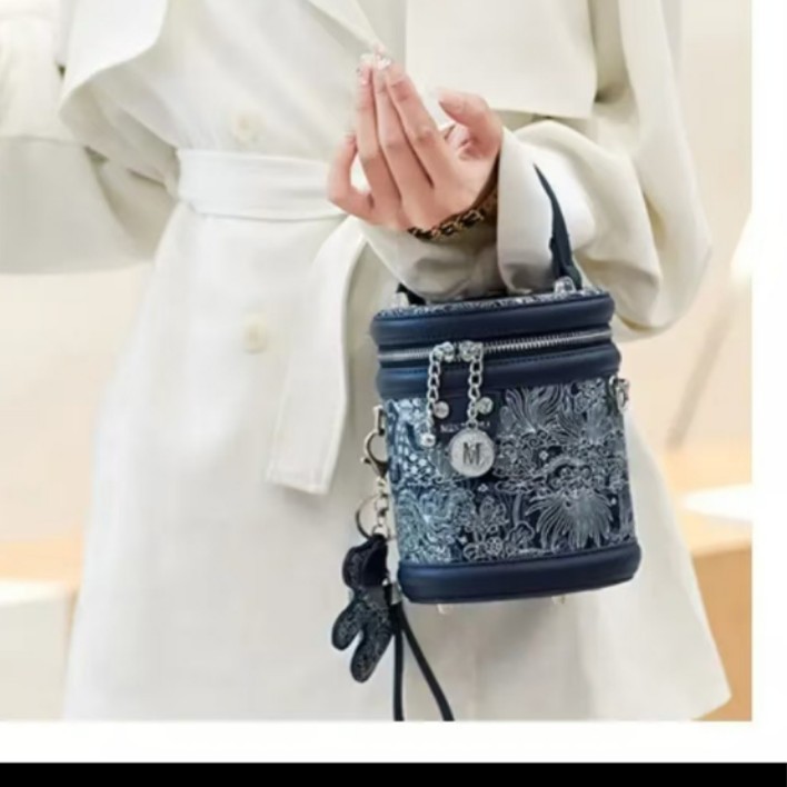 2025 nuevo bolso de cubo bordado de lujo ligero bolso de hombro portátil de viaje de todo fósforo para mujer bolso de mensajero portátil de gran capacidad