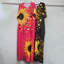 设计感2025新款女连衣裙宽松太阳花印花亮片时尚显瘦度假风长裙潮
