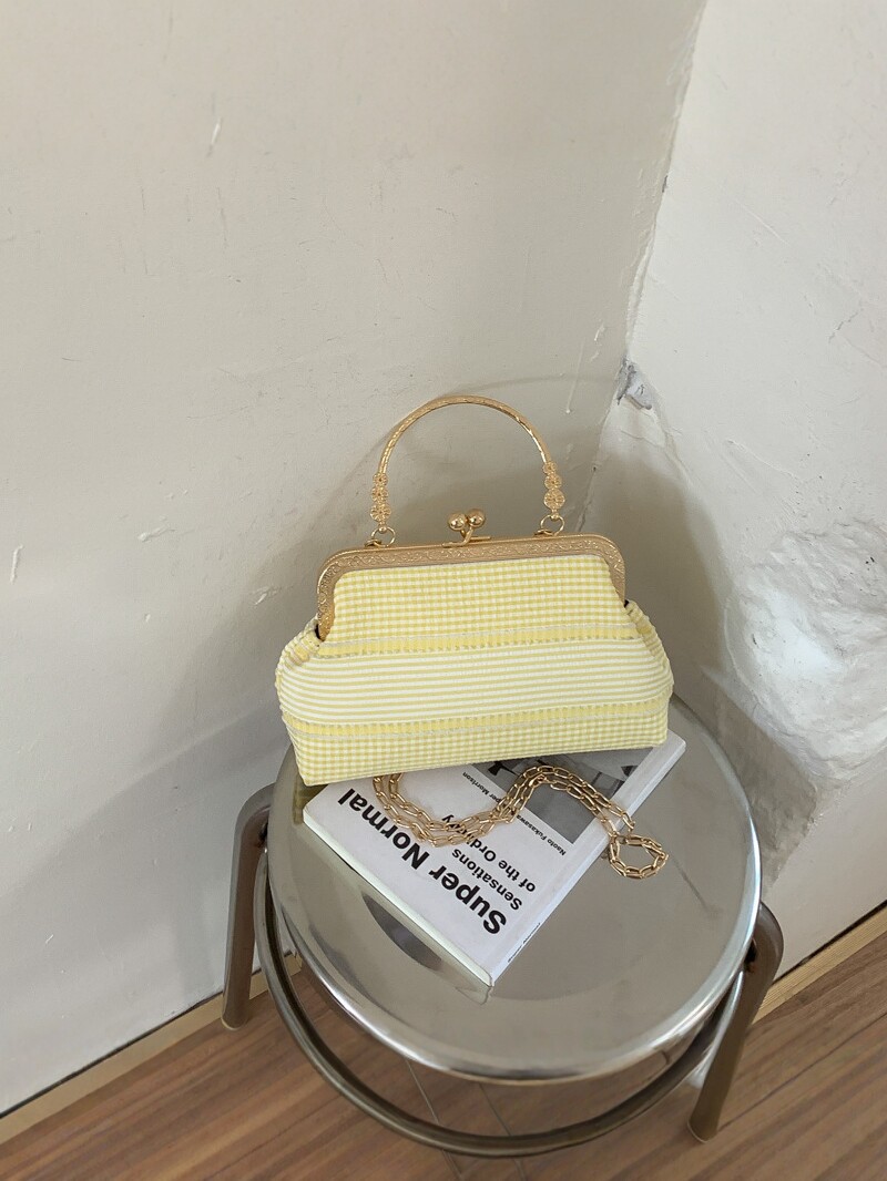 2026 nuevo bolso de celosía de cadena de mujer bolso de mano de alto nivel bolso de cena de cinturón simple bolso de hombro de viento