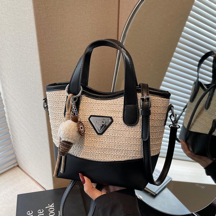 Bolso de mano de color de contraste tejido de estilo caliente de verano para mujer 2025 nuevo bolso de cubo simple salvaje estilo occidental para mujer