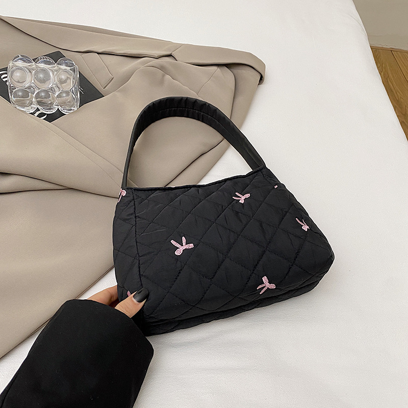 2024 nuevo bolso de arco de bordado, bolsa de maquillaje de gran capacidad, bolsa de lavado, bolsa de ocio, bolsa de mujer