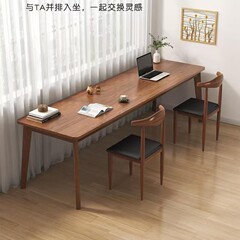 二人の机の長いテーブルの実木の脚は窓に寄りかかって壁に寄りかかって狭いテーブルの机のコンピュータのテーブルの家庭の寝室に寄りかかっている