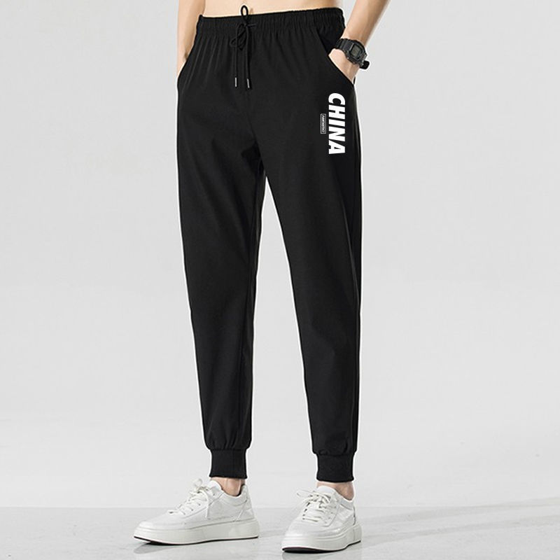 Pantalones de hombre, verano 2022, nueva marca de moda, pantalones deportivos, talla grande, holgados, estampados, joggers, informales, de nueve puntos