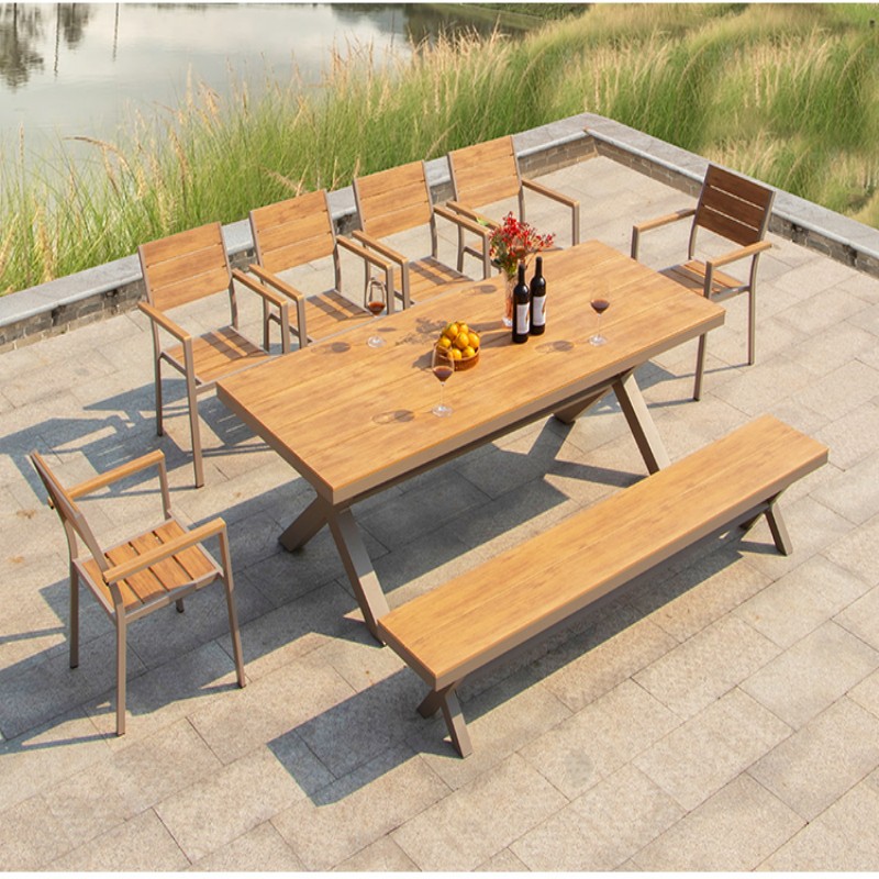 Outdoor table and chair set, made of plastic wood and aluminum alloy, various materials available. Outdoor balcony leisure cafe, anti-corrosion wooden combination table and chair set.