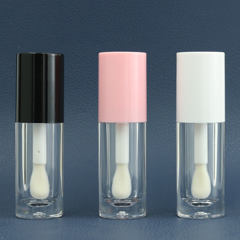 En stock al por mayor 7mm cepillo grande varilla redonda tubo de brillo de labios tubo de lápiz labial esmalte de labios tubo vacío sub-botella logotipo imprimible