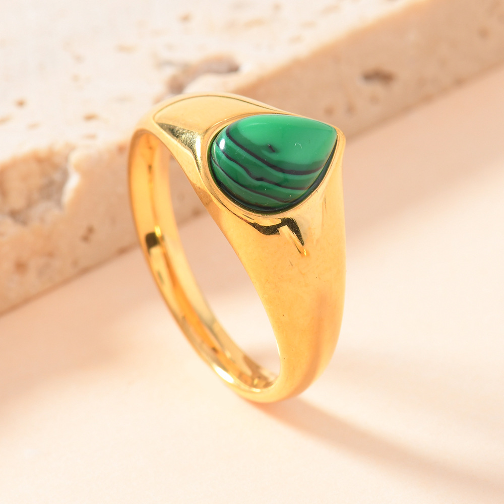 Anillo de acero de titanio de moda europea y americana mujer no se desvanece fundición de gota de agua anillo de piedra natural joyas de lujo al por mayor
