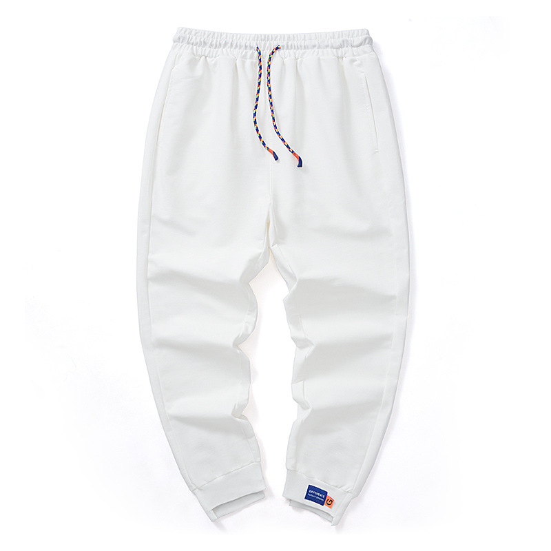 Pantalones de estilo de Hong Kong Pantalones deportivos de alta calidad para hombres pantalones de chándal de color sólido de punto pantalones casuales para hombres