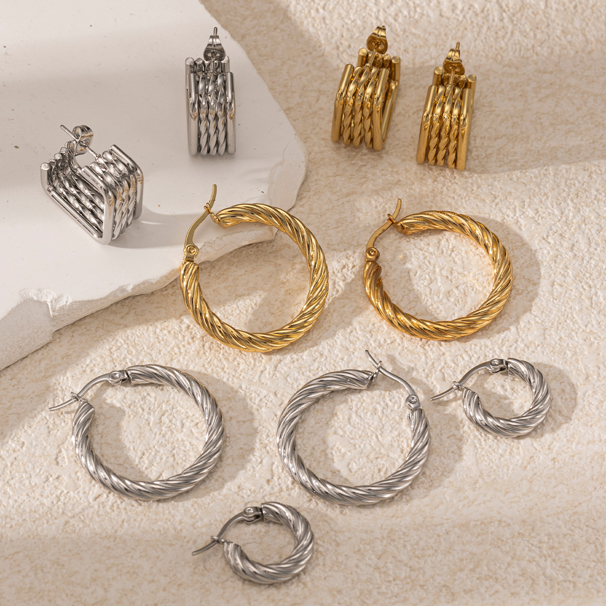 Taina europa y americana pendientes de acero inoxidable lujoso ligero de alto nivel sentido de rosca de tornillo torcido de acero de titanio de color contraste joyería no se desvanece