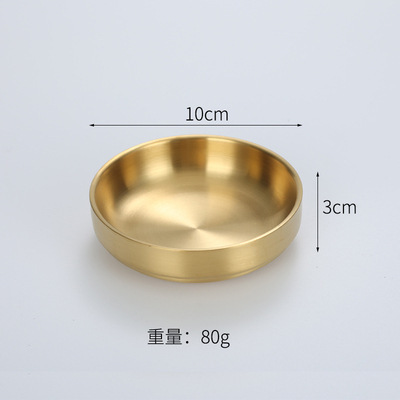 韓国式ステンレス焼肉食器鍋みそ皿に調味料皿をつけて金色の箸を並べます。|undefined