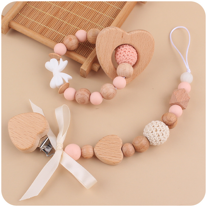 Nuevo bebé hecho a mano bowknot chupete cadena calmante bebé DIY amor mordedor pulsera juguete conjunto de dos piezas