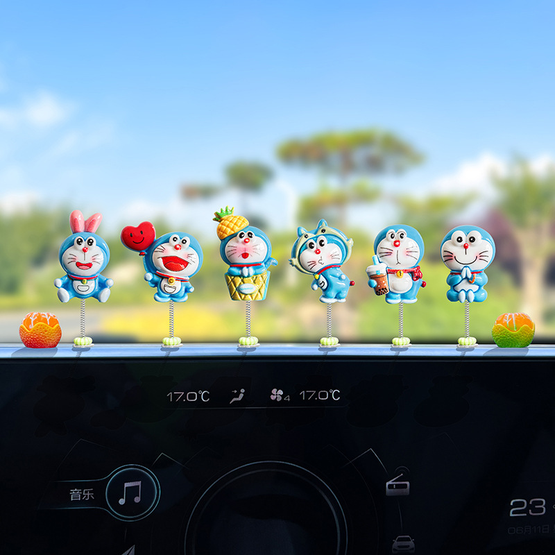 Nuevo lindo Doraemon decoración de coche creativo consola central de coche decoración de espejo retrovisor eléctrico interior