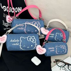 漫画の猫の斜めのショルダーバッグのデニムの2025の新型のミニの円筒は猫の刺繍の手提げの包みの携帯電話の包みを包みます