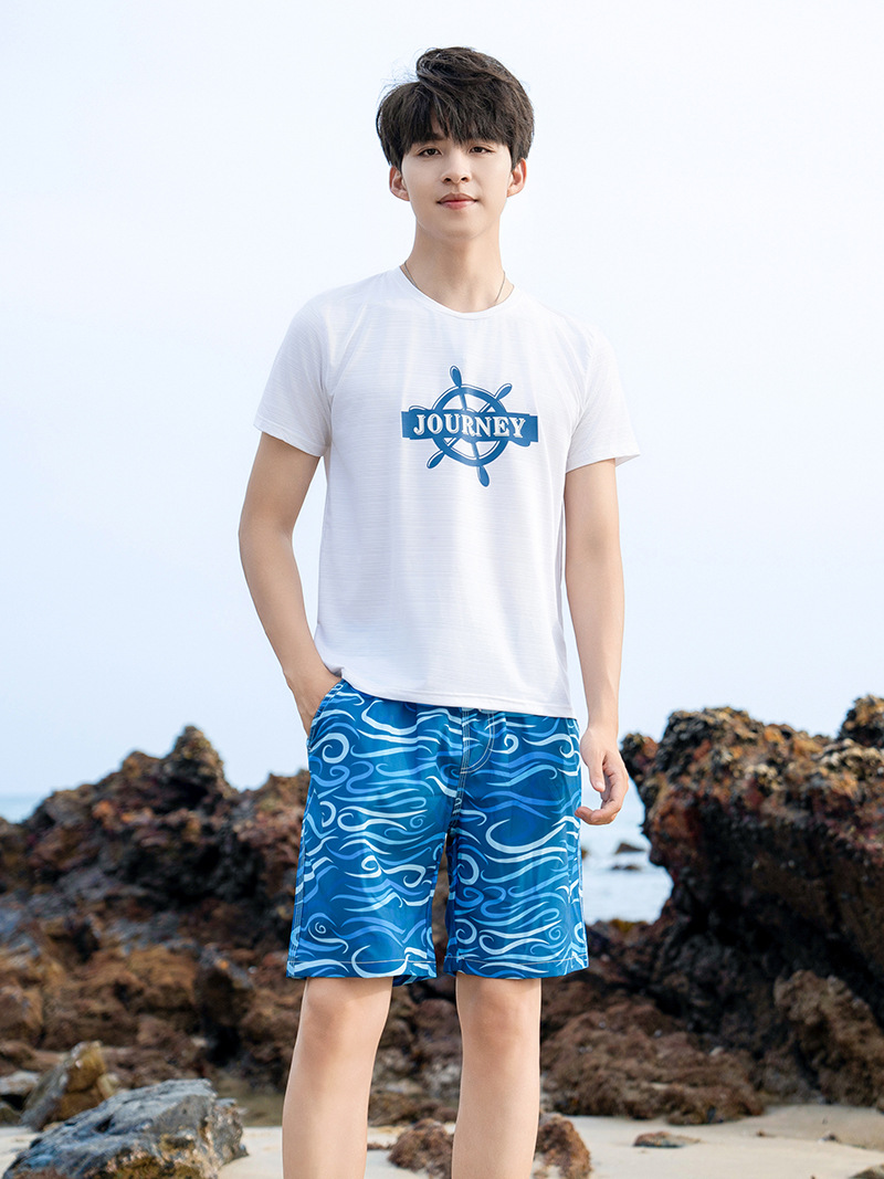 Pantalones de playa para hombres, vacaciones en el mar, pantalones cortos deportivos casuales para parejas, pantalones de baño de ángulo plano para mujeres.
