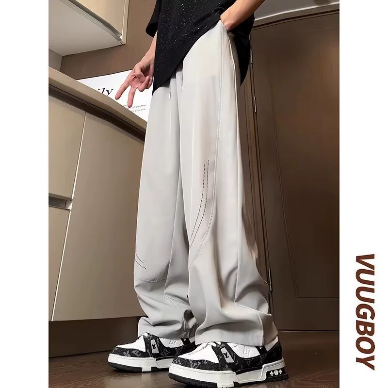Повседневные брюки мужские 2024 новые летние тонкие широкие ноги свободные прямые брюки тренд дикого льда шелковые брюки