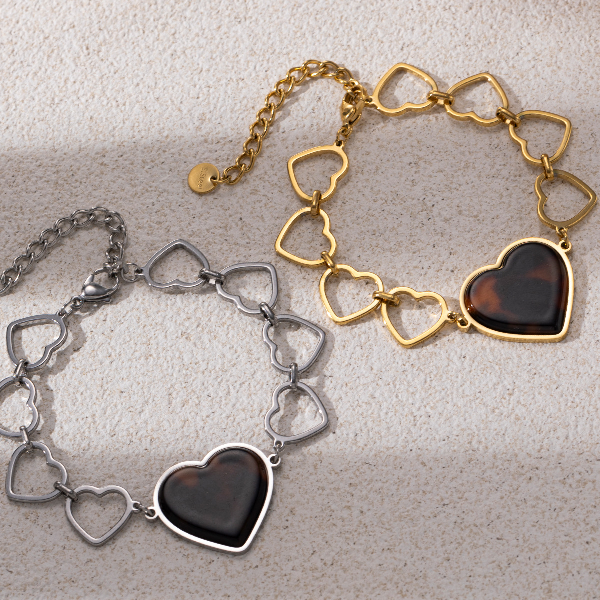 TENA Europa y América de acero inoxidable amor pulsera lujo ligero de alto nivel cadena de amor hueco de acero de titanio bicolor joyería de brazalete