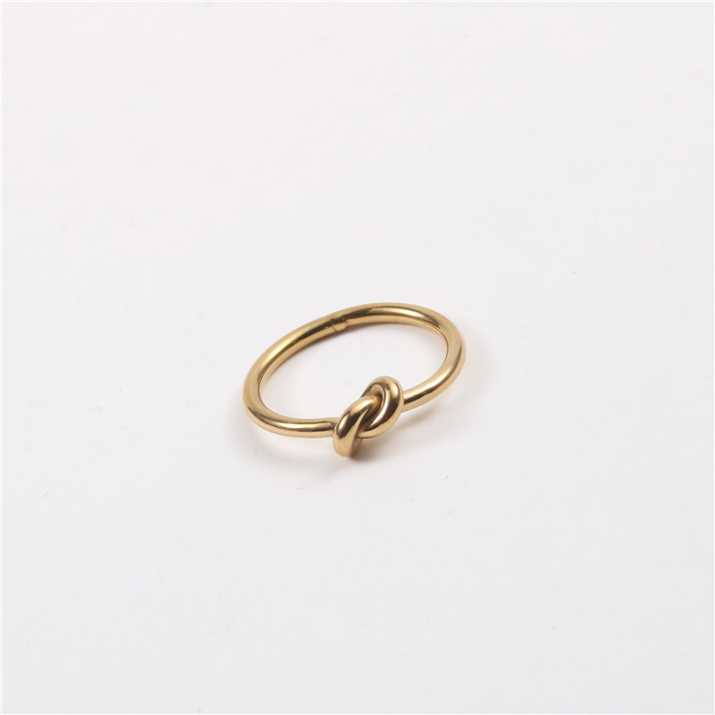 Línea de metal creativo anudado anillo femenino ins moda abierta dedo índice anillo de titanio de acero