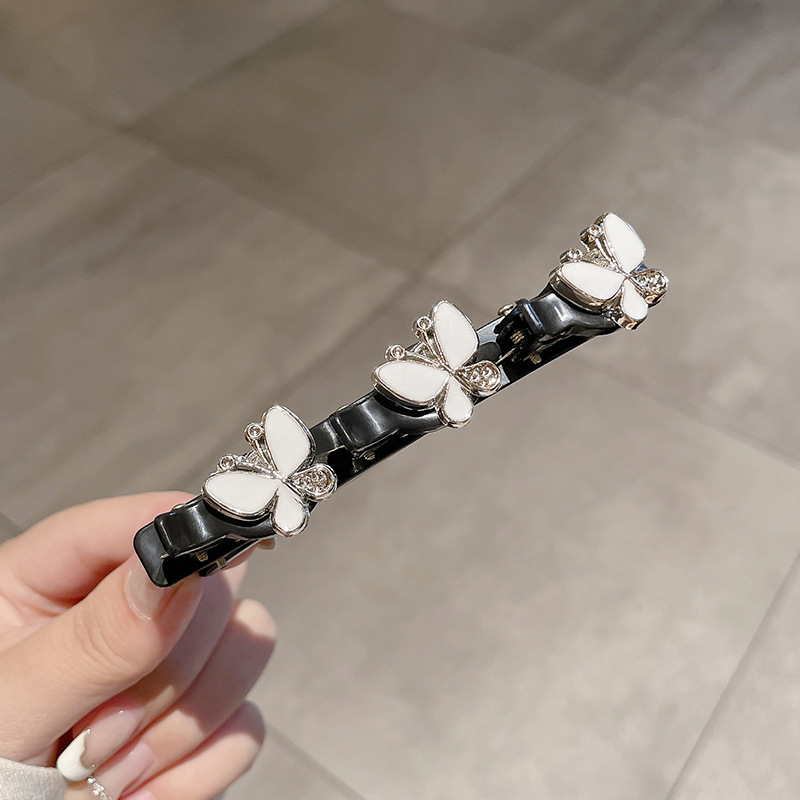 20 # Mariposa blanca.