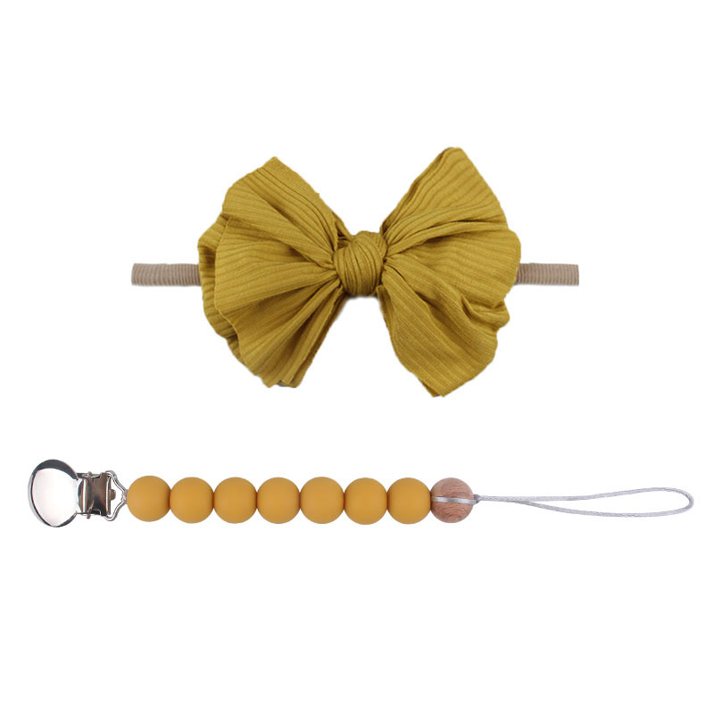Accesorios para el cabello del bebé de Europa y América del arco de nylon banda para el cabello bebé suministros bebé chupete de silicona pezón anti-caída traje de cadena