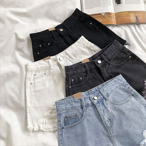 Ripped denim shorts for female students 2021 spring and summer new versatile slimming wide-leg raw edge a-line hot pants ins trend