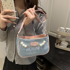 今年人気の女性用コントラストカラースモールバッグ2025新しいファッション多用途クロスボディバッグシングルショルダー脇の下スモールスクエアバッグ卸売