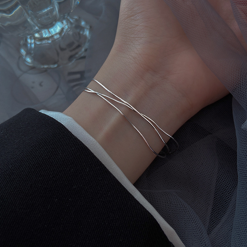 Three-Layer Snake Bone Bracelet for Women, Simple and Elegant, High-End Feel, Minimalist Style, Light Luxury, Niche Design Accessory Three-Layer Snake Bone Bracelet for Women, Simple and Elegant, High-End Feel, Minimalist Style, Light Luxury, Niche Design Accessory
