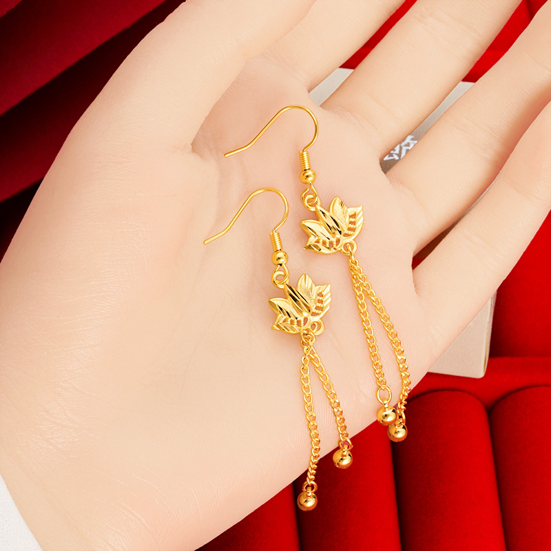 Pendientes de loto oro arena pendientes largos borla de las mujeres joyería de aleación de cobre Internet celebridad mismo suministro pendientes de estilo chino