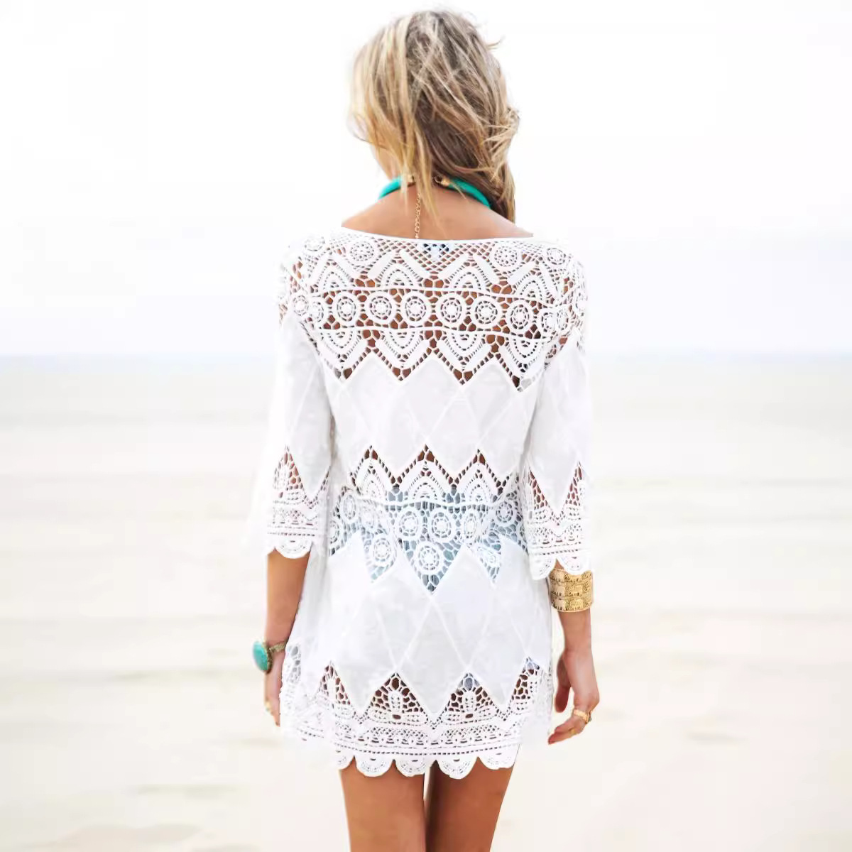 Europa y América nuevo hueco de ganchillo parche bordado playa bikini blusa playa vestido