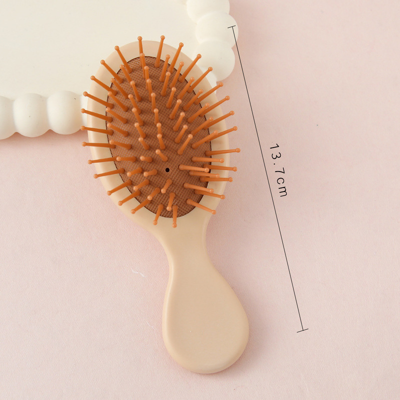 マカロンエアバッグコーム学生ポータブルヘアコーム女性のポータブルエアクッションコームマッサージコーム家庭用ヘアコーム小さなコーム|undefined