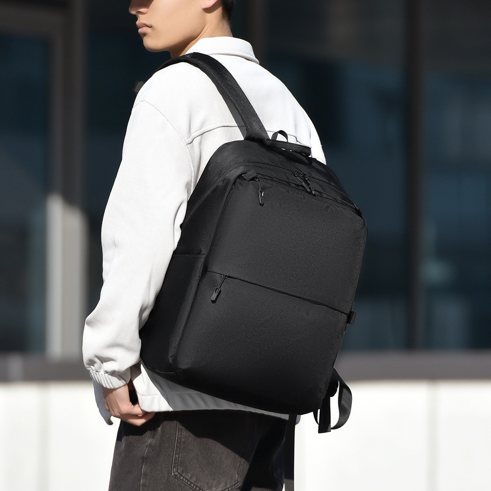 Mochila de negocios simple de hombre transfronteriza, mochila de estudiantes ligera transfronteriza de gran capacidad, mochila de moda a prueba de salpicaduras