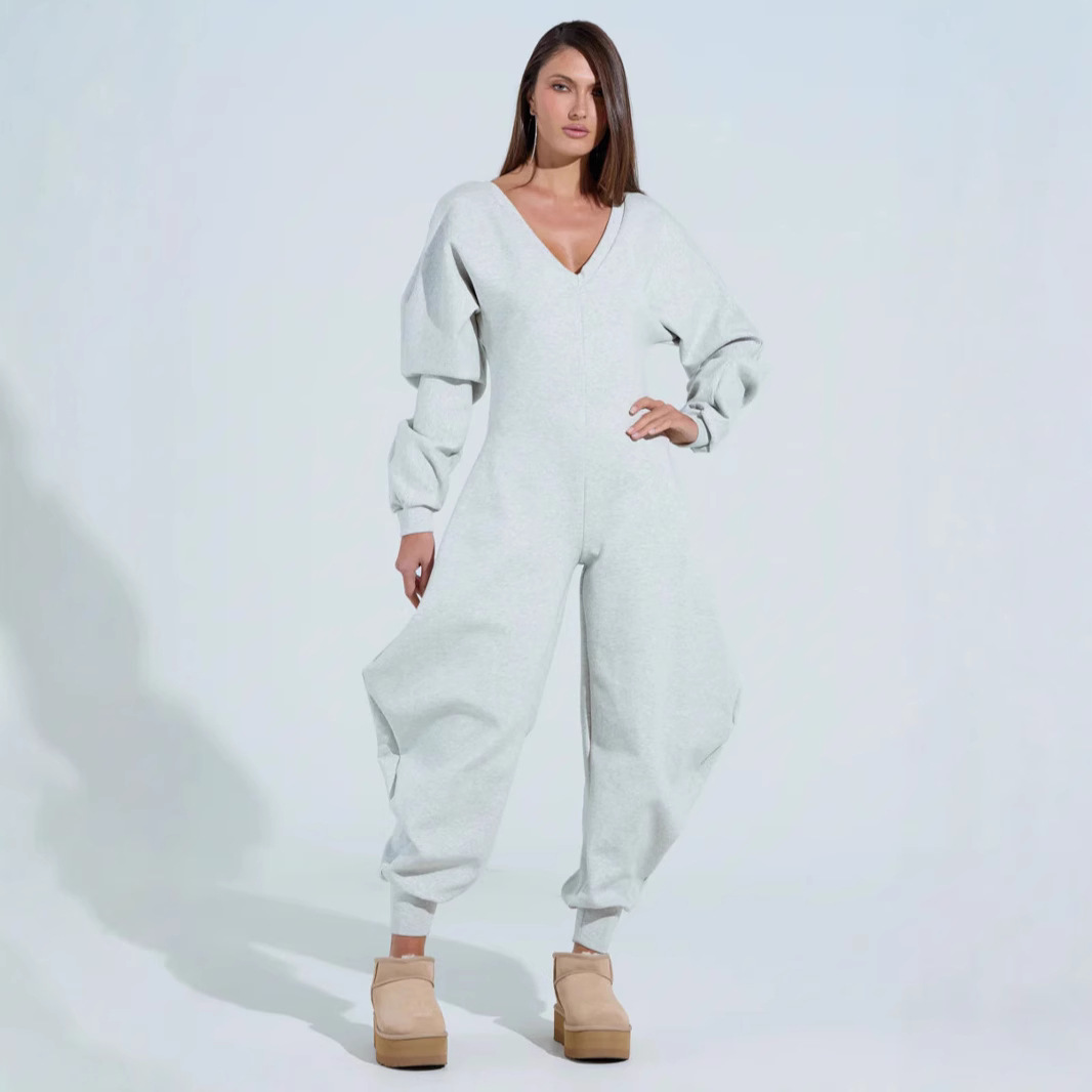 Amazon independent station European and American women's jumpsuit flared pants tight V-neck sexy long sleeve jumpsuit