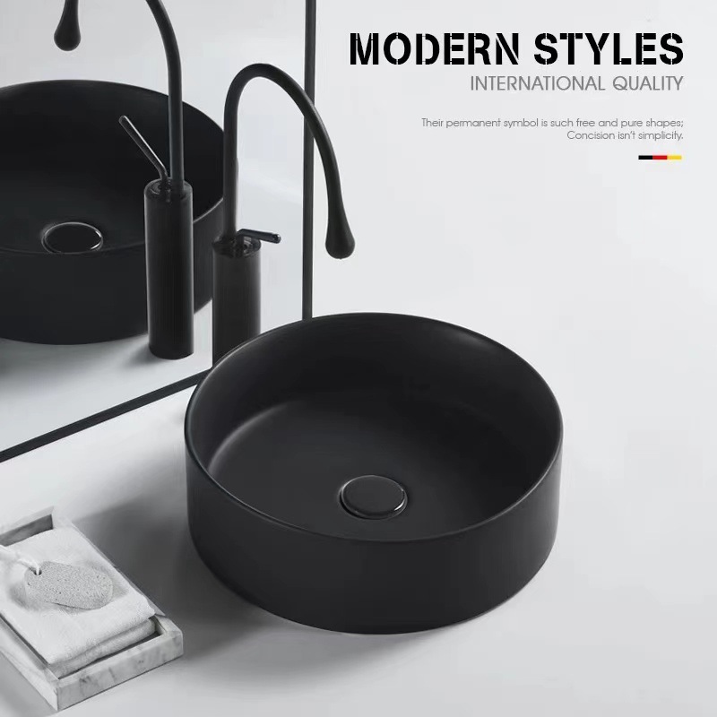 Estilo nórdico creativo mate negro lavabo pequeño tamaño lavabo de cerámica lavabo único lavabo balcón cuenca redonda