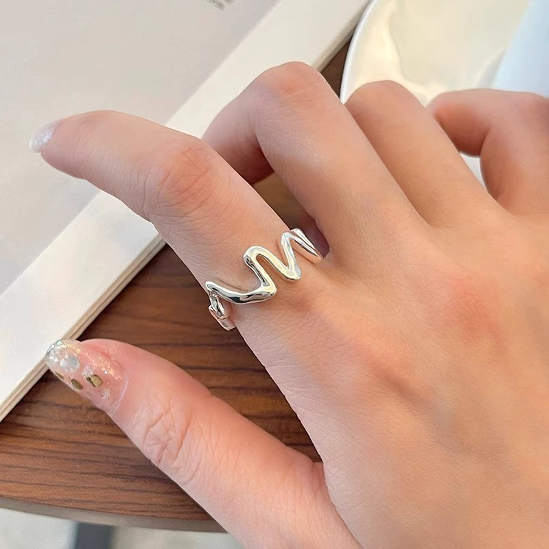 Wavy fashionable silver ring, Korean style, simple and elegant design, on index finger