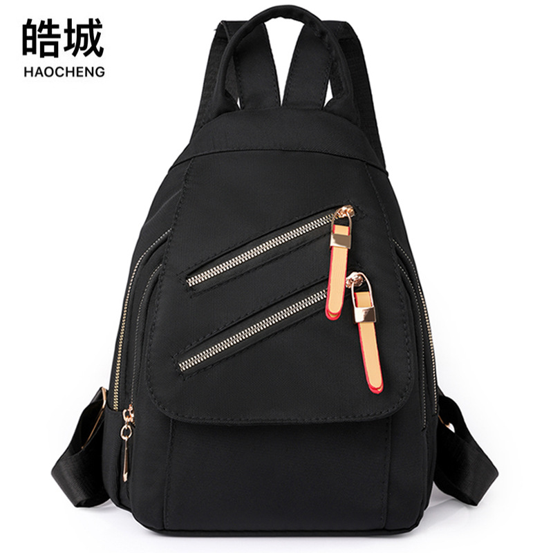 2023 nueva mochila casual para mujer de nailon moda plegable salvaje viaje al aire libre mochila mochila escolar al por mayor