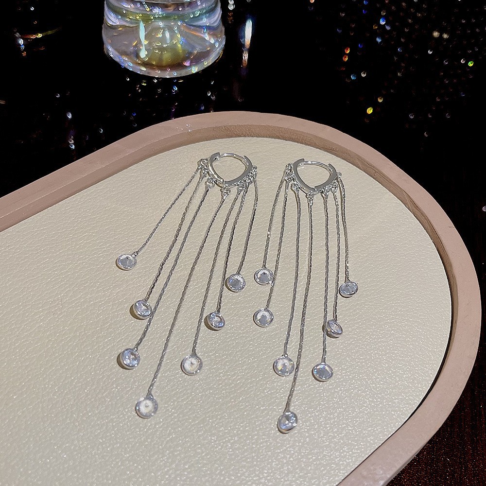 S925 aguja de plata elegante borla pendientes de alta gama simple cara de adelgazamiento pendientes de todo fósforo estilo coreano nuevos pendientes de moda al por mayor