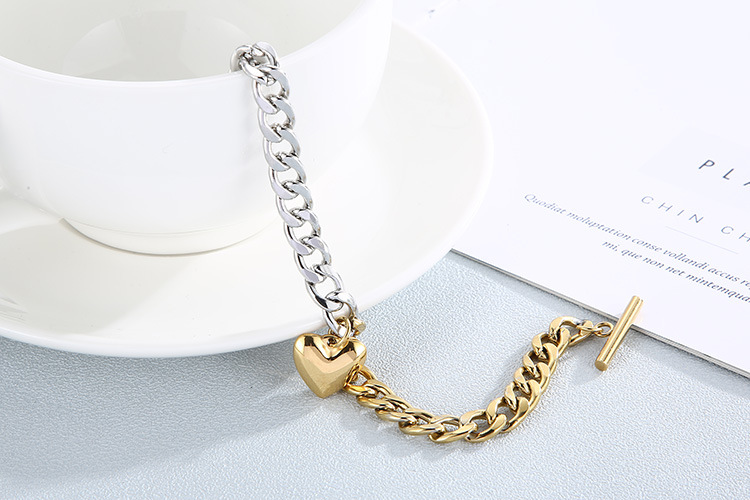 wholesale Europe and America OT buckle heart pendant stainless steel suit wholesale