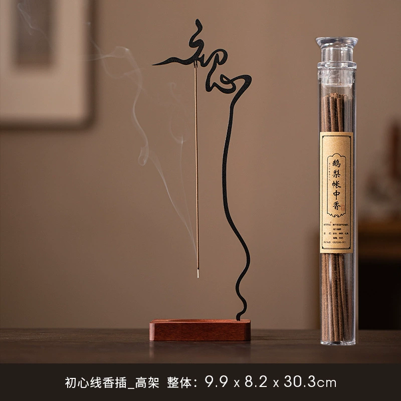 Палочка‑курильница (Zen) — висящая палочка с лотосовой чашей на деревянной квадратной подставке, внутри помещения