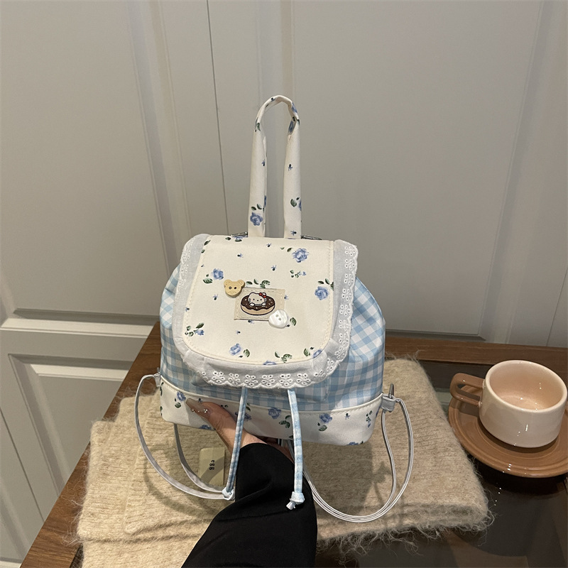 Japón dulce puro deseo mochila de encaje 2025 nueva chica coreana encantadora viaje flor pegatinas mochila pequeña