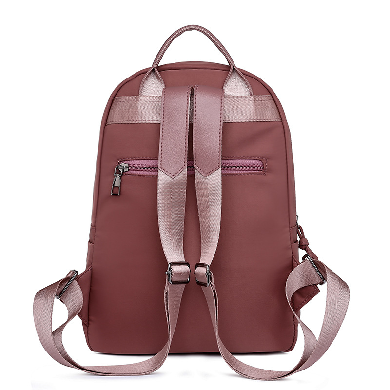 Fuente de origen 2023 nueva mochila Oxford para mujer coreana, mochila de viaje al aire libre de moda simple y versátil