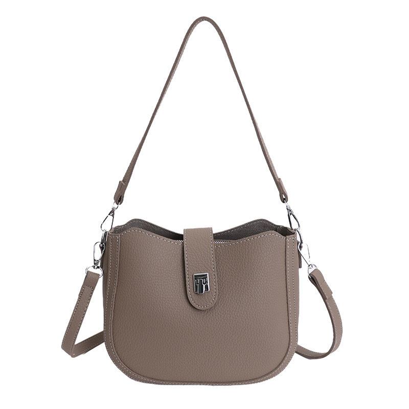 Hot sale nuevo nicho coreano litchi estampado bolso de cubo de hombro para mujeres sensación de lujo ligero versátil bolso de transporte de viaje