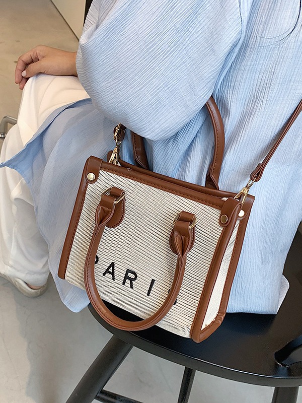 Bolsos para mujer, estilo nuevo transfronterizo, bolso tote de lona con letras bordadas, bolso de hombro cruzado informal de alta gama para ir al trabajo