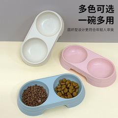 犬の碗のメーカーの卸売りのキャンディー色の飲用水は一体の猫の碗の双碗のプラスチックを与えてひっくり返してペットの碗を洗いやすいです。