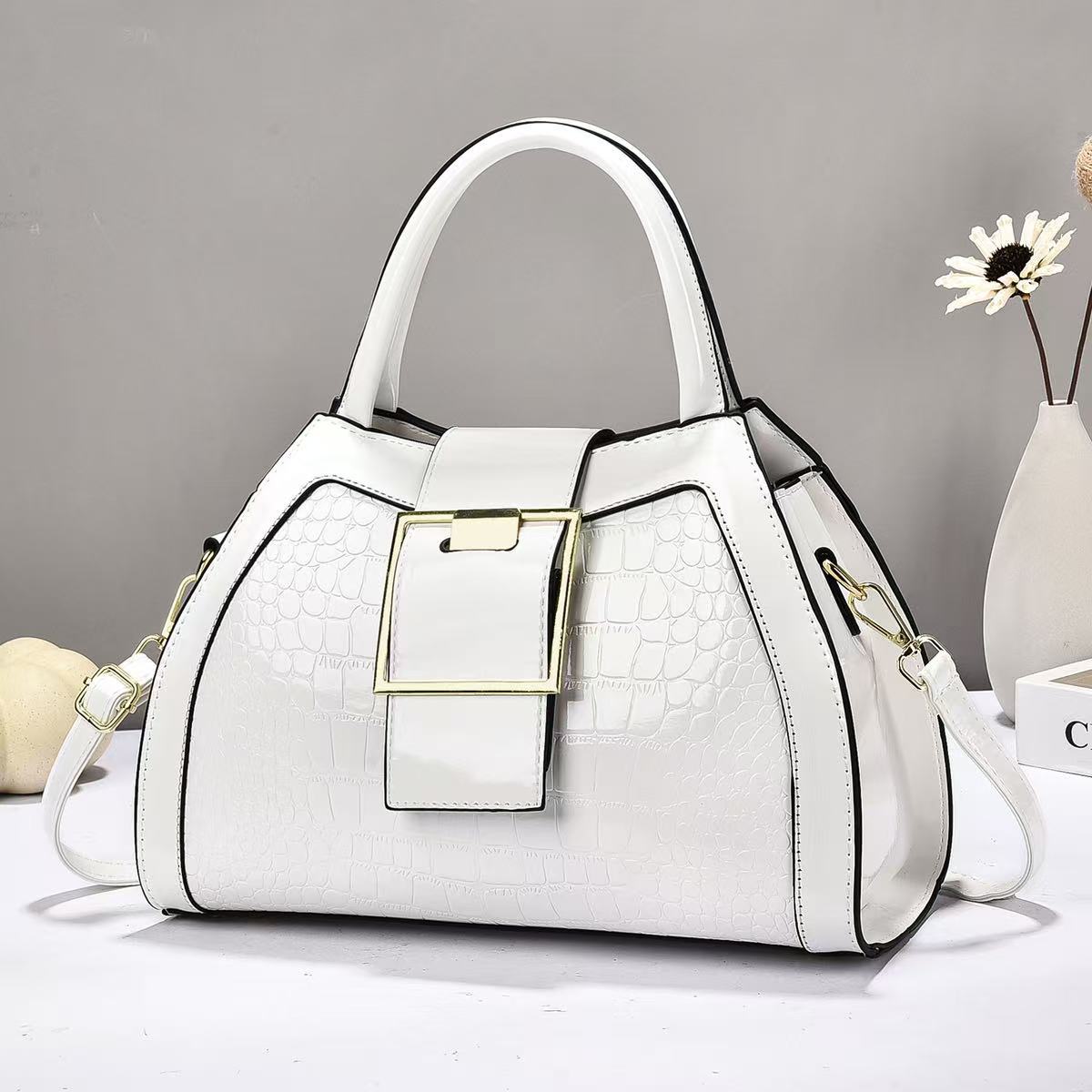 Bolsa de mano de piel brillante de piedra de gran capacidad simple atmósfera mochila de hombro de moda casual bolsas transfronterizas